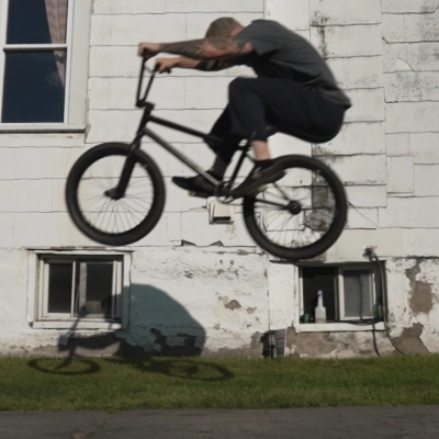 Billy Kennedy tucking a bunnyhop to show how to really lift the bike off of the ground