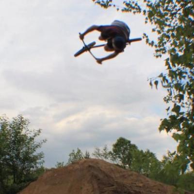 Billy Kennedy doing a Nose Dive 360 on a BMX at whitesox trails.