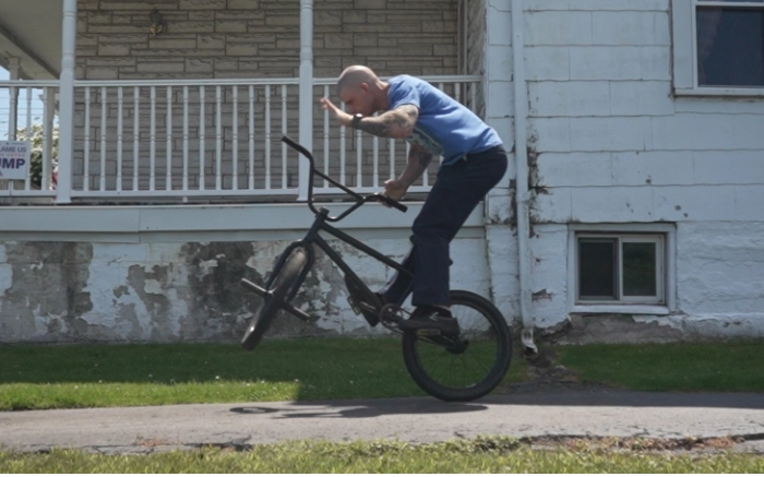 Billy Kennedy Performing the manual (pull-up) barspin